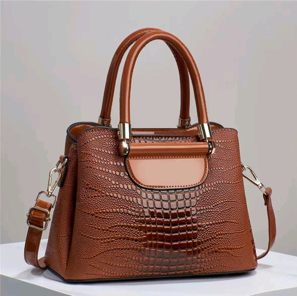 Crocodile skin hand bags